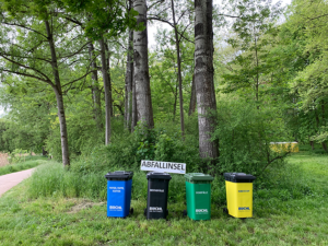 Audi Triathlon Ingolstadt powered by Büchl 2023 -Abfallinsel im Grünen